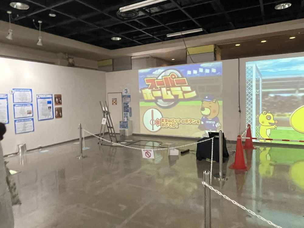 スーパーシューターで的を狙う子供